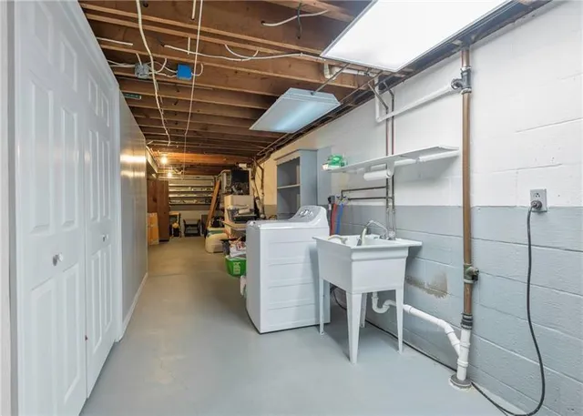 a storage room with washer and dryer