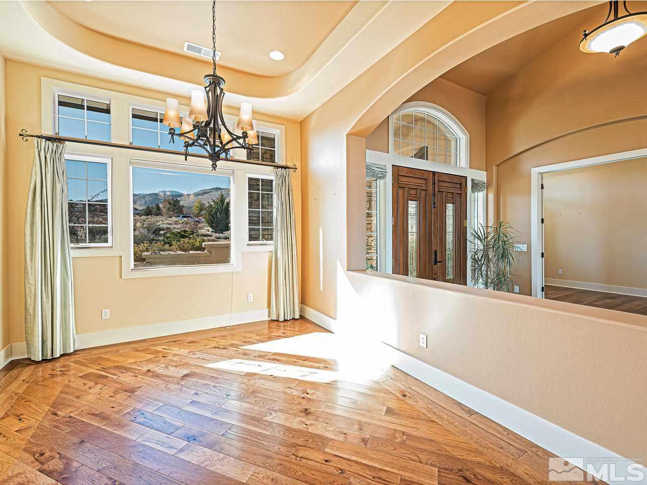 3644 Silver Vista Drive Reno, NV 89511 - Photo 11 of 40 a view of a big room with wooden floor and windows