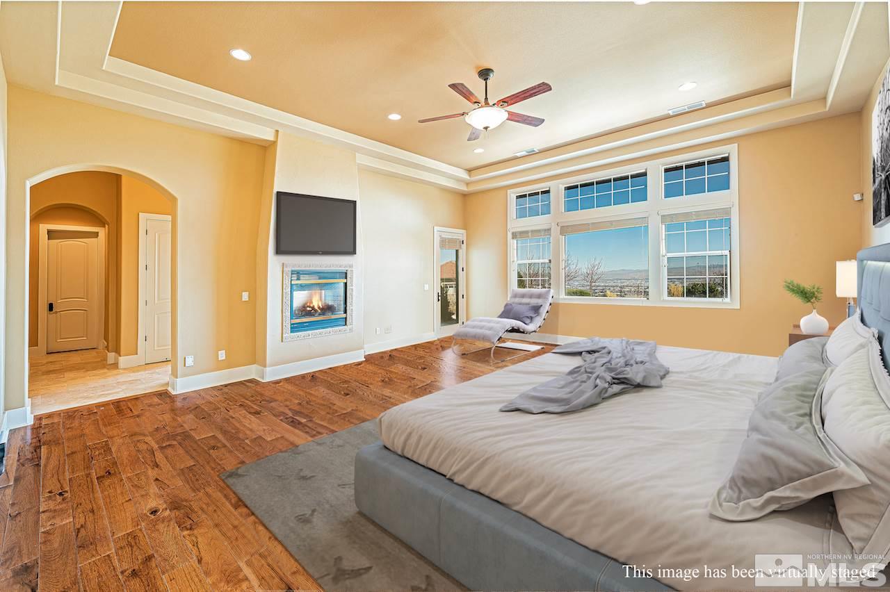 3644 Silver Vista Drive Reno, NV 89511 - Photo 13 of 40 a bedroom with a bed and a large window