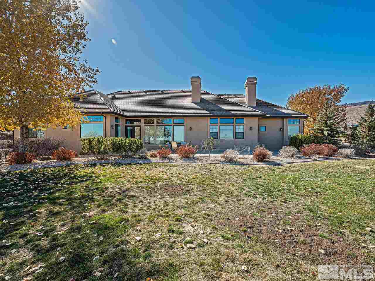 3644 Silver Vista Drive Reno, NV 89511 - Photo 24 of 40 a front view of a house with garden