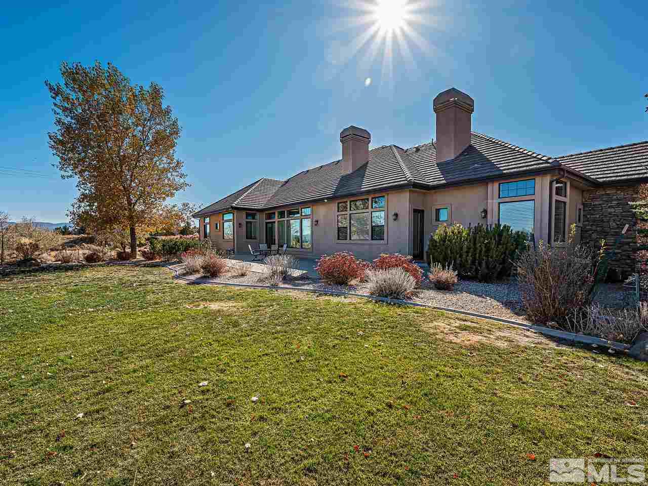 3644 Silver Vista Drive Reno, NV 89511 - Photo 25 of 40 a front view of a house with garden