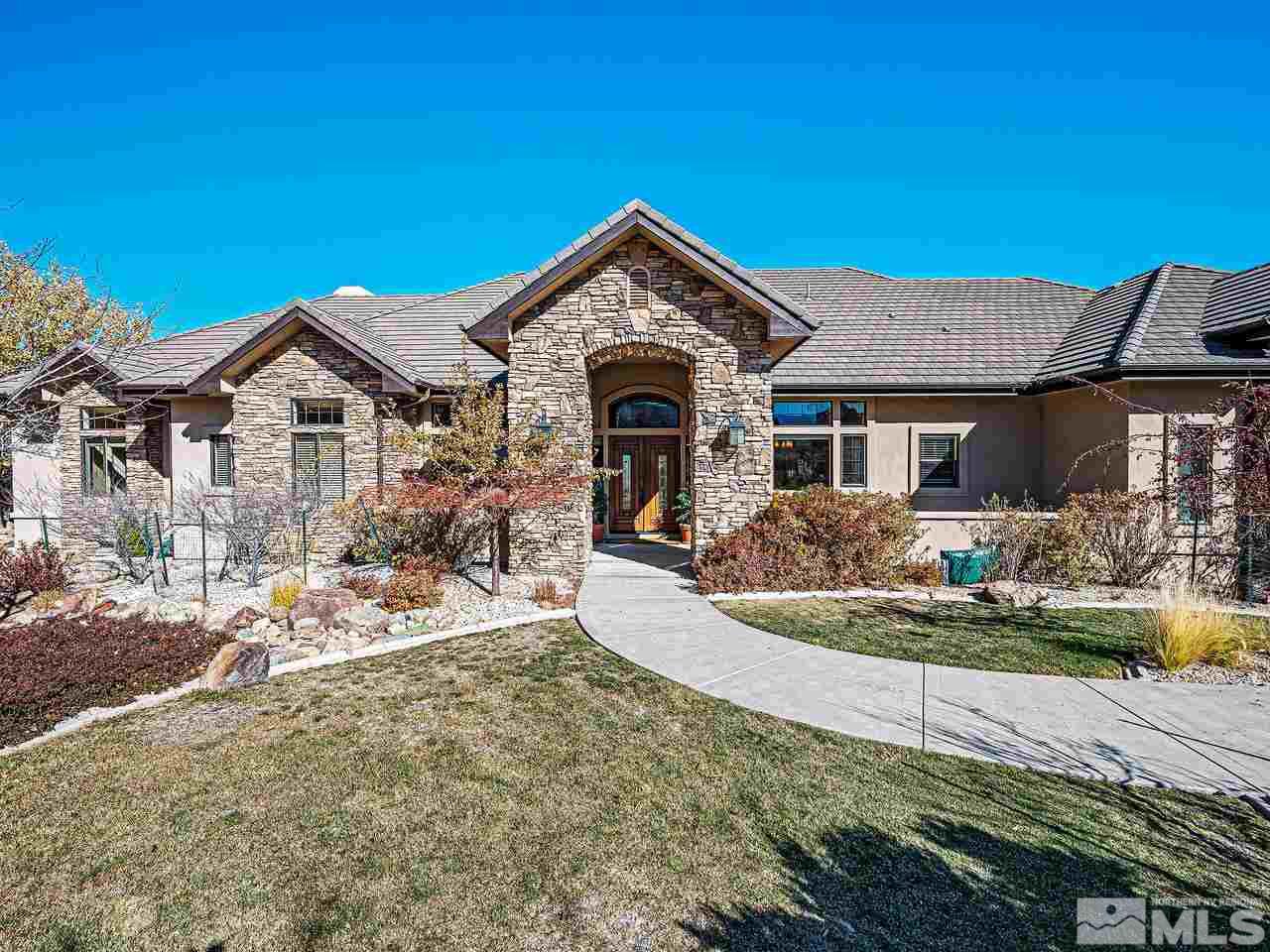 3644 Silver Vista Drive Reno, NV 89511 - Photo 26 of 40 a front view of a house with a yard