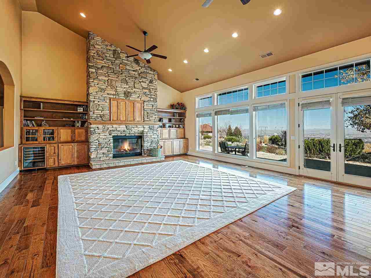 3644 Silver Vista Drive Reno, NV 89511 - Photo 3 of 40 a living room with furniture and a fireplace