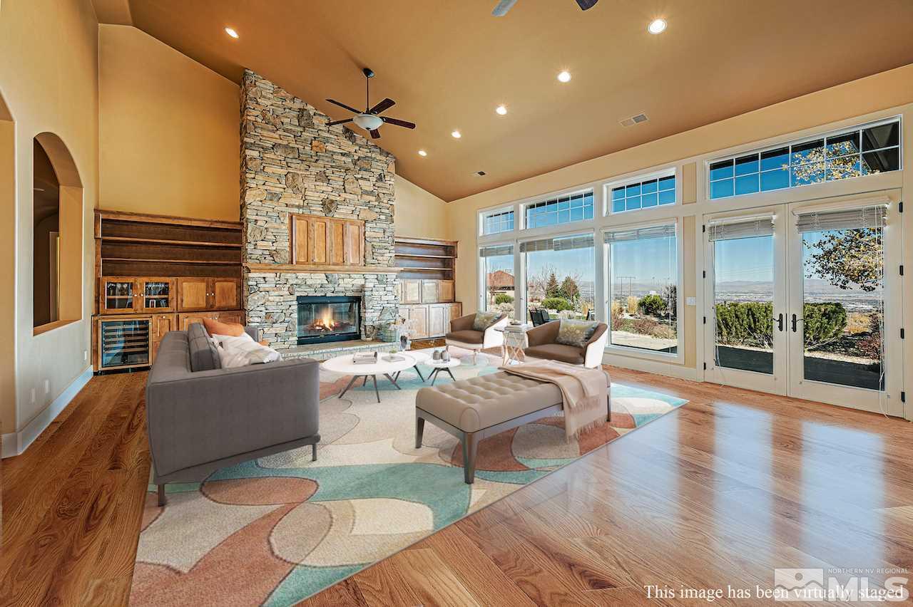 3644 Silver Vista Drive Reno, NV 89511 - Photo 4 of 40 a living room with fireplace furniture and a large window