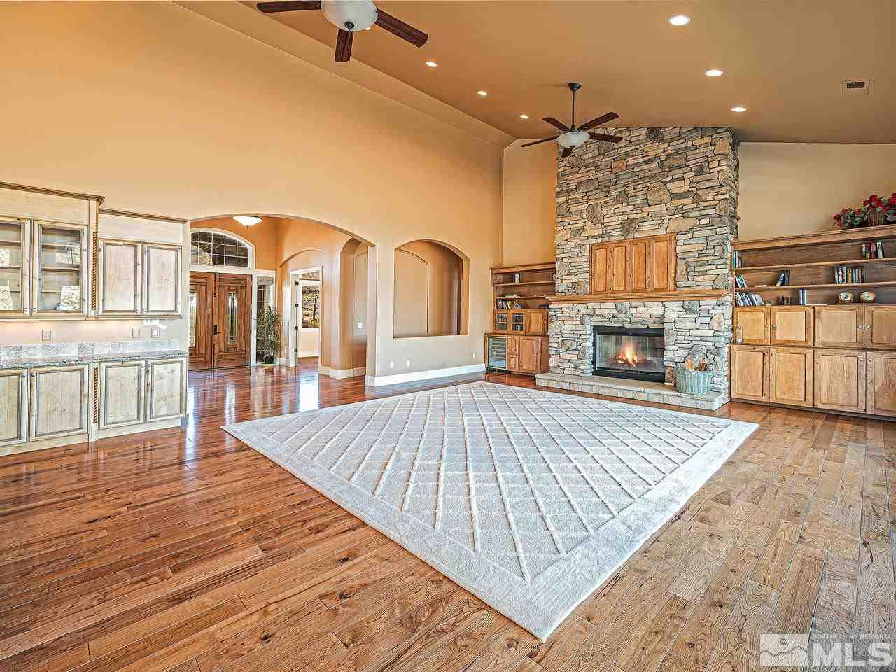 3644 Silver Vista Drive Reno, NV 89511 - Photo 5 of 40 a living room with furniture and a fireplace