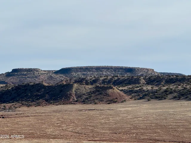a view of ocean and mountain