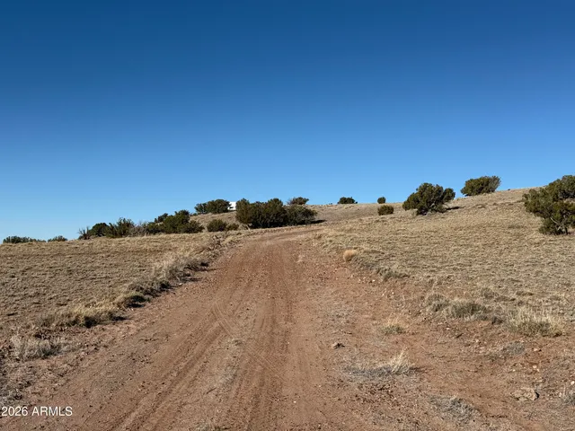 a view of ocean with a beach