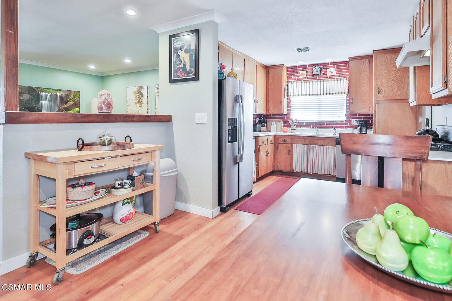 2248 Cutler Street Simi Valley, CA 93065 - Photo 14 of 41 a kitchen with a refrigerator and a stove