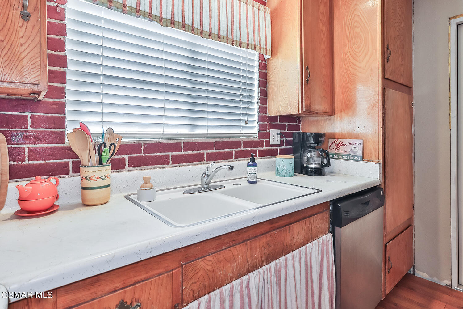 2248 Cutler Street Simi Valley, CA 93065 - Photo 17 of 41 a bathroom with a sink and a window