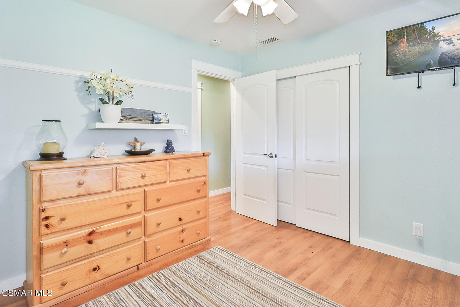 2248 Cutler Street Simi Valley, CA 93065 - Photo 20 of 41 a room with a dresser and a mirror
