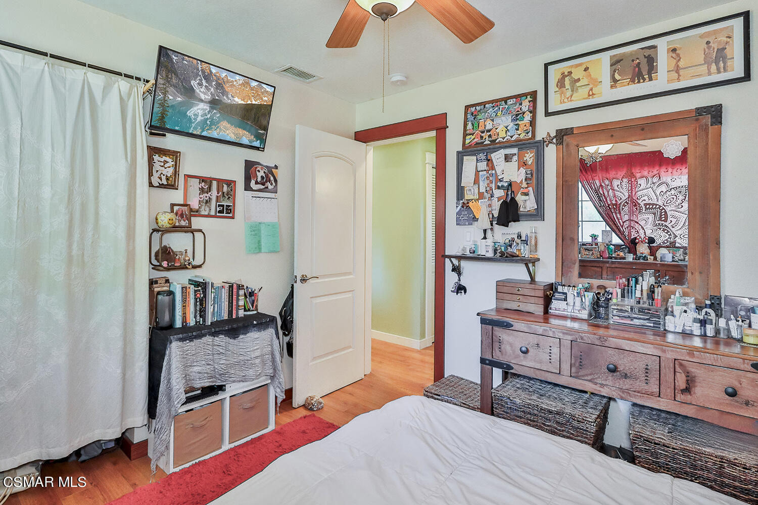 2248 Cutler Street Simi Valley, CA 93065 - Photo 24 of 41 a living room with furniture and a painting on the wall