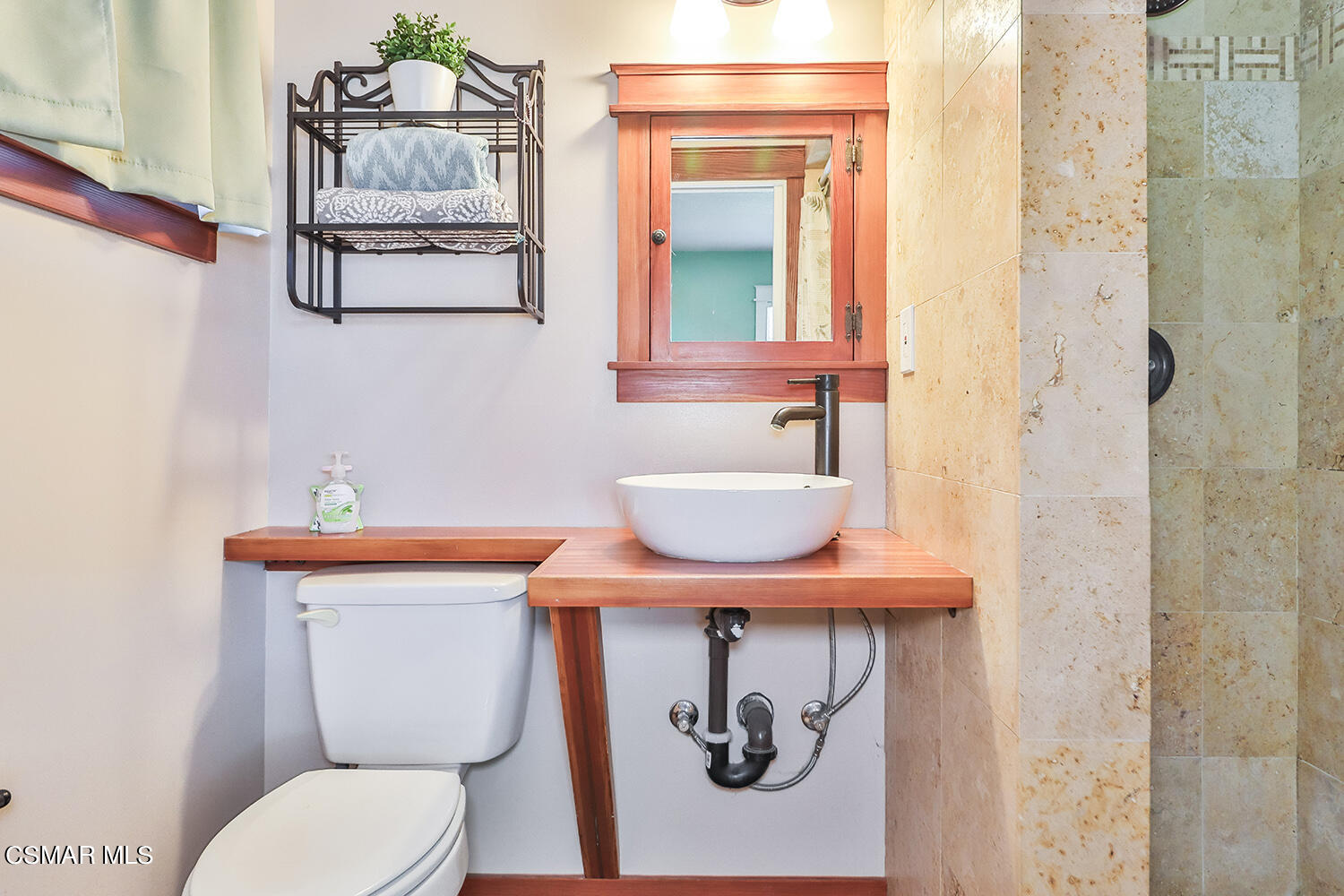 2248 Cutler Street Simi Valley, CA 93065 - Photo 31 of 41 a bathroom with a toilet sink and mirror