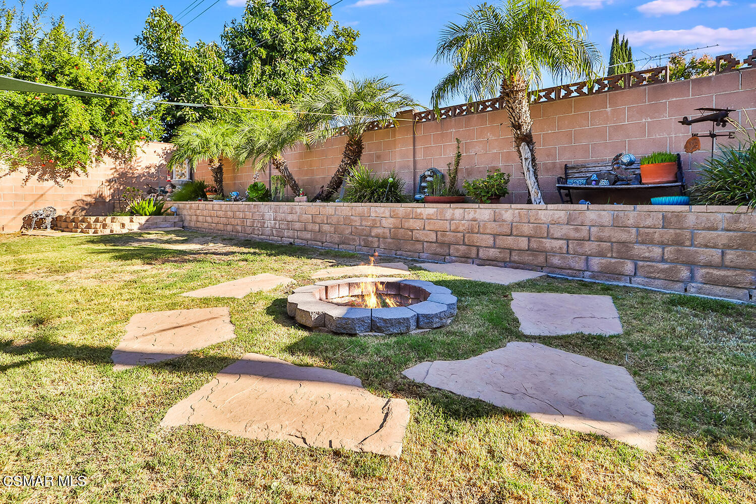 2248 Cutler Street Simi Valley, CA 93065 - Photo 37 of 41 a view of a swimming pool with an outdoor space and seating area