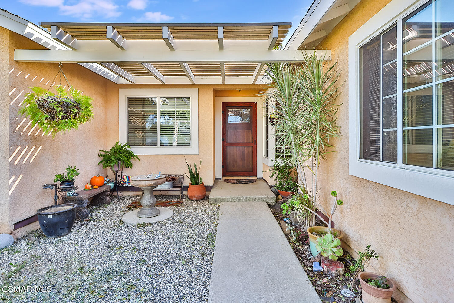 2248 Cutler Street Simi Valley, CA 93065 - Photo 5 of 41 a view of a house with potted plants