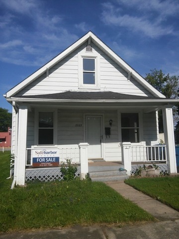 3323 Halsted Street Steger, IL 60475 - Photo 1 of 1 a front view of a house with a garden