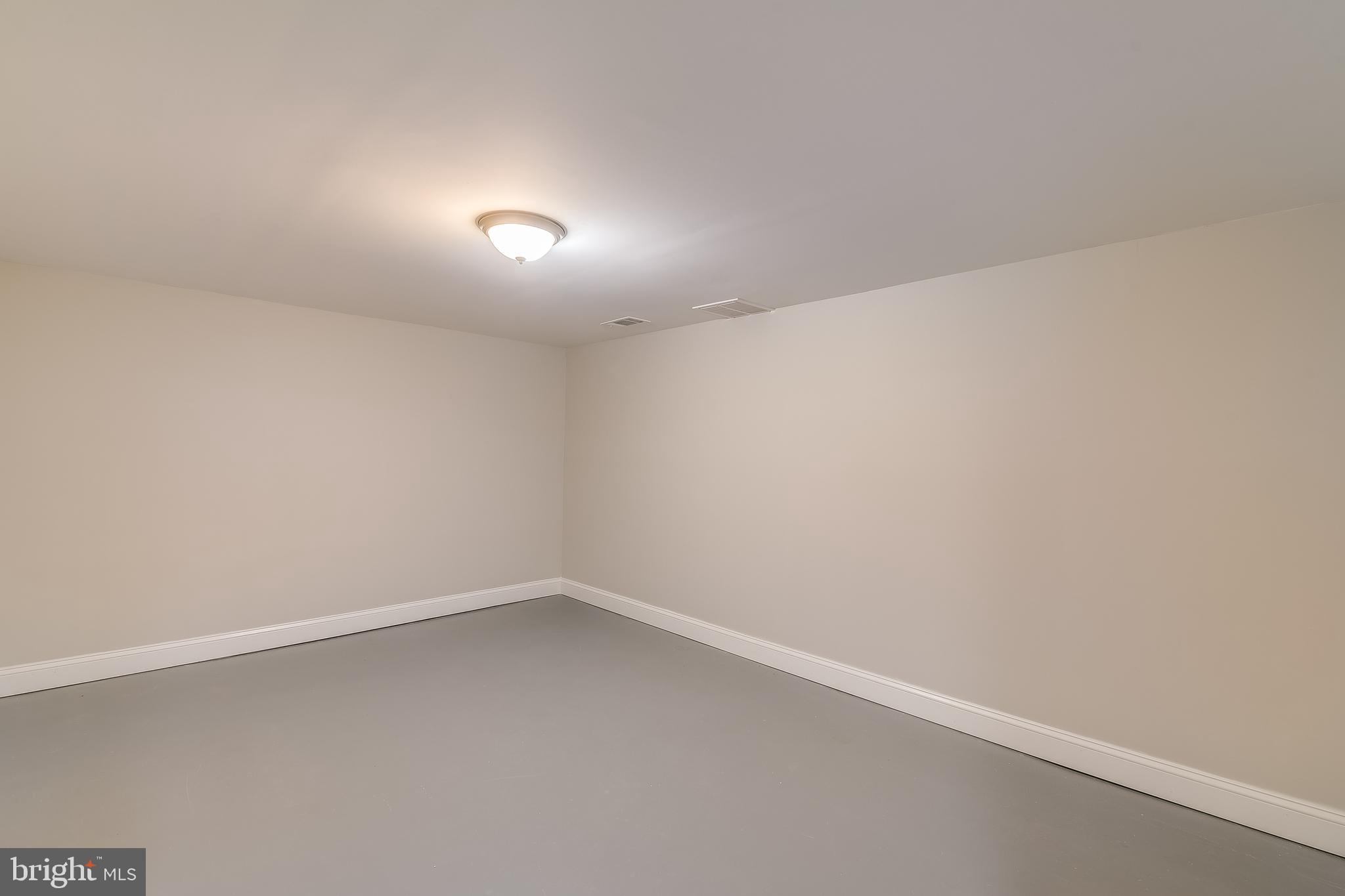 8408 Maryland Road Pasadena, MD 21122 - Photo 40 of 47 LL Finished Space for Playroom/Office/
Guest
