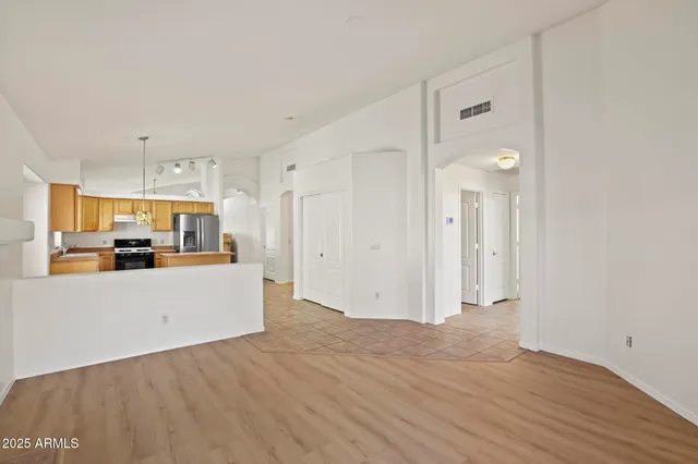 a view of kitchen with wooden floor