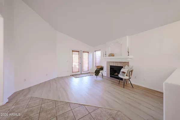 a living room with furniture and a window