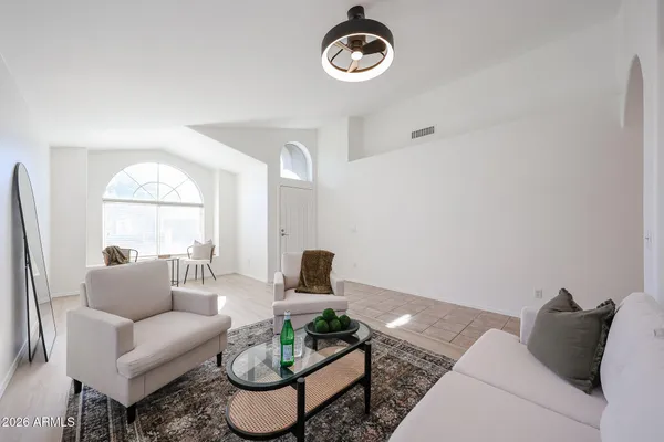 a living room with furniture and a window