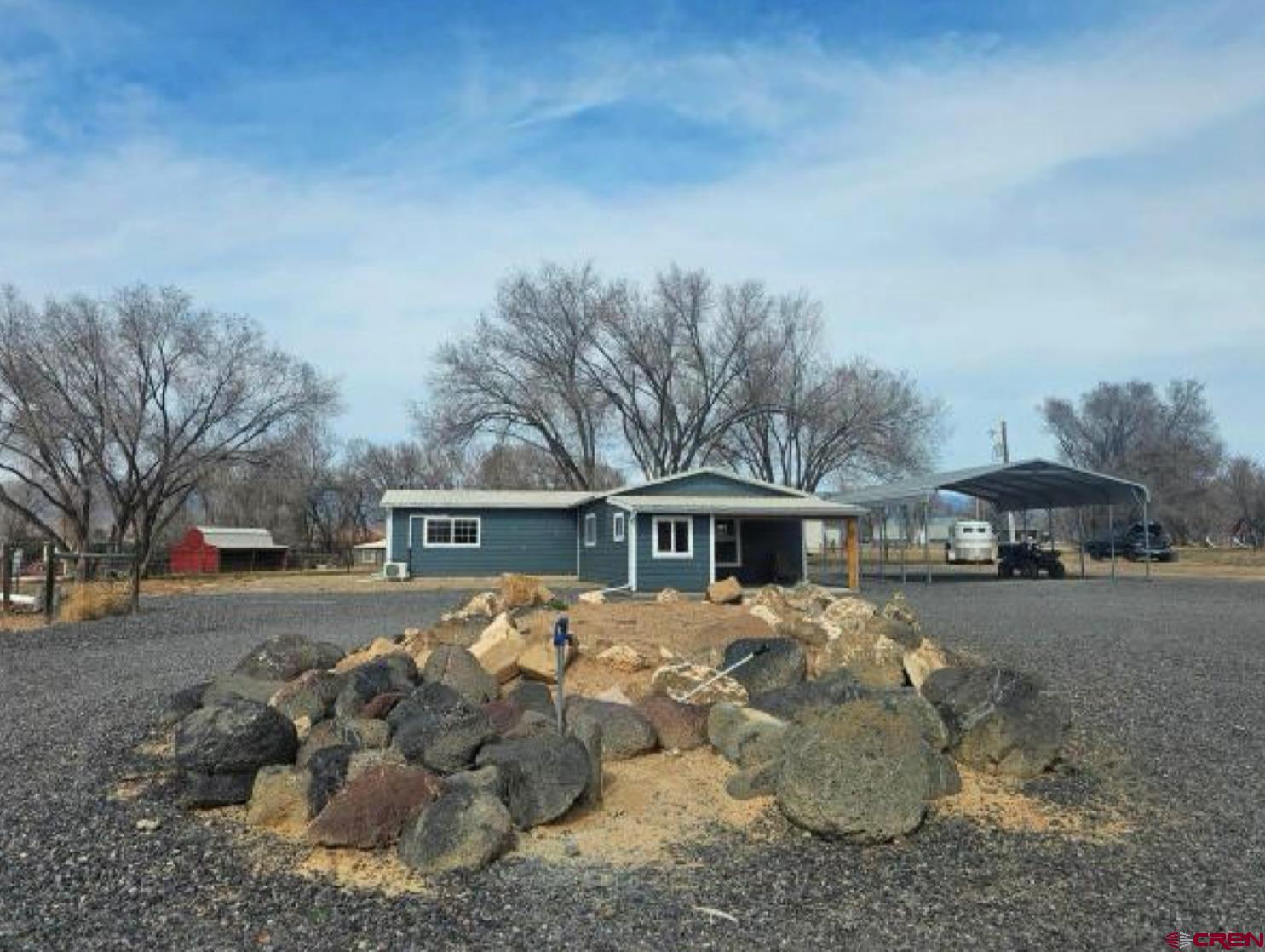20167 Fairview Road Austin, CO 81410 - Photo 1 of 4 a front view of a house with a yard