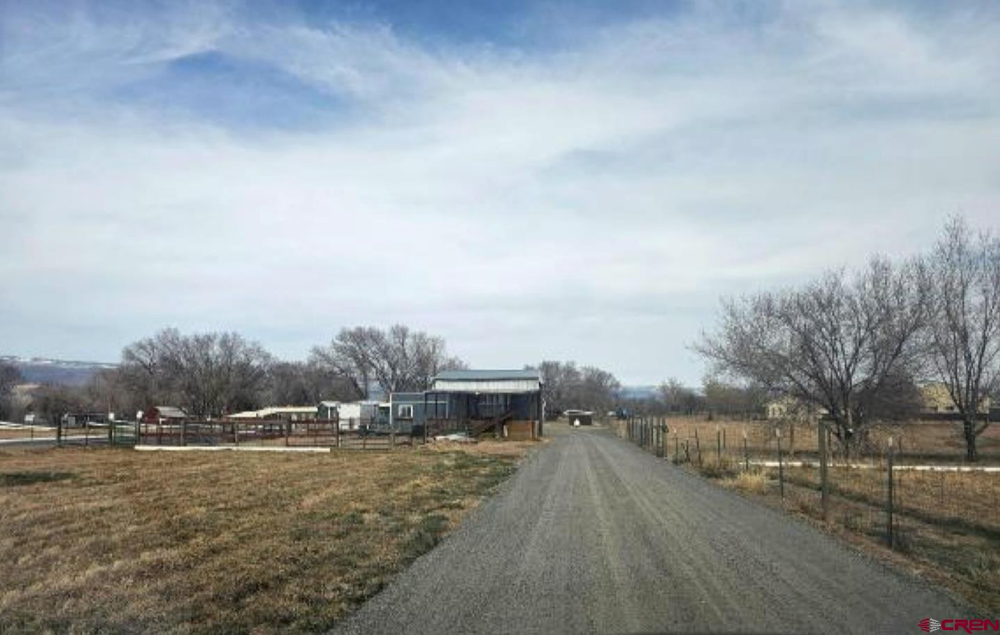 20167 Fairview Road Austin, CO 81410 - Photo 2 of 4 a view of a town with mountains in the background
