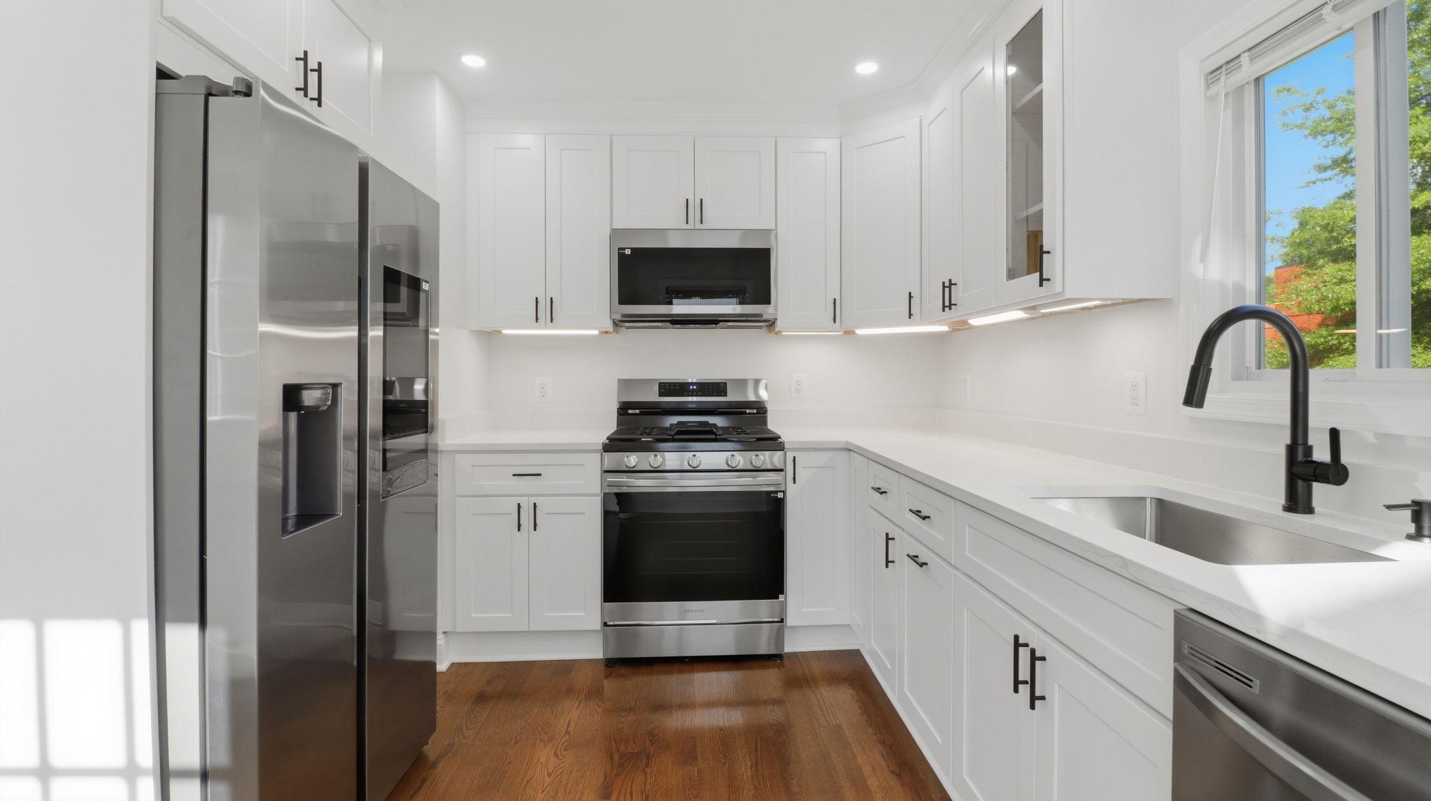 5633 Jamestown Road Hyattsville, MD 20782 - Photo 11 of 47 Kitchen w/ stainless steel appliances