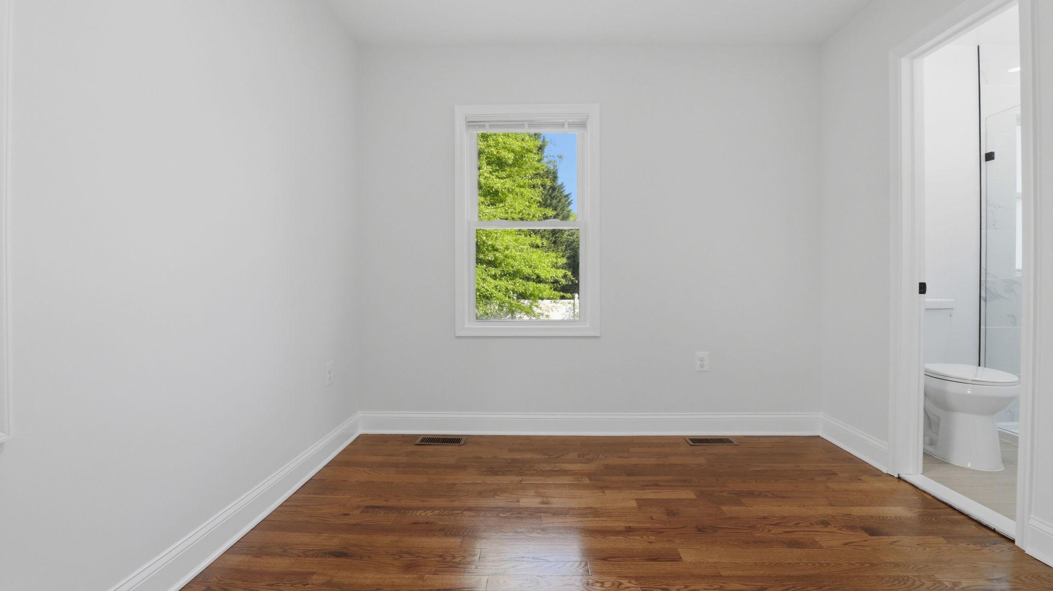 5633 Jamestown Road Hyattsville, MD 20782 - Photo 17 of 47 Master Bedroom w/ Master Bathroom