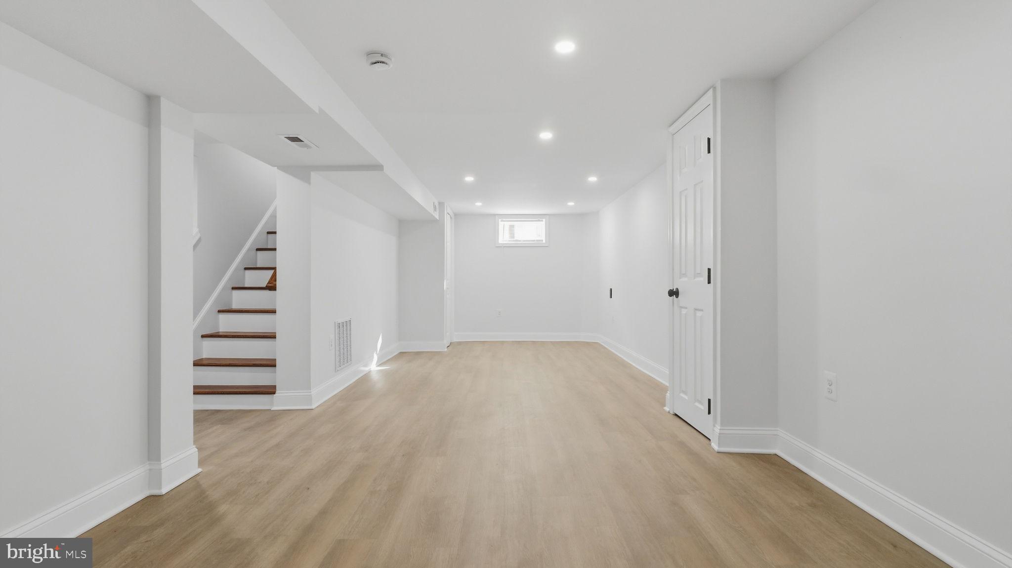 5633 Jamestown Road Hyattsville, MD 20782 - Photo 29 of 47 Bright and spacious basement retreat.