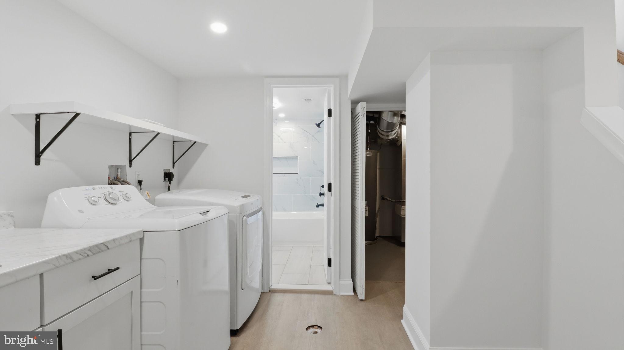 5633 Jamestown Road Hyattsville, MD 20782 - Photo 33 of 47 Bright and airy laundry space.