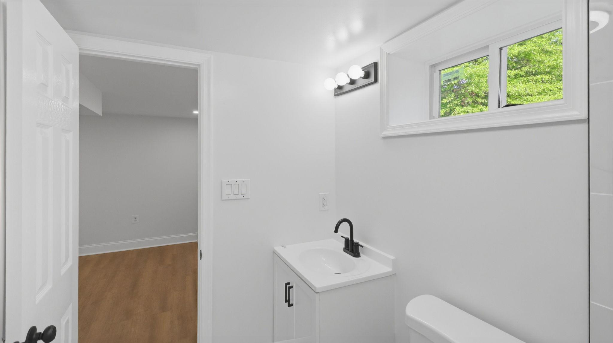 5633 Jamestown Road Hyattsville, MD 20782 - Photo 37 of 47 Basement Level Full Bathroom