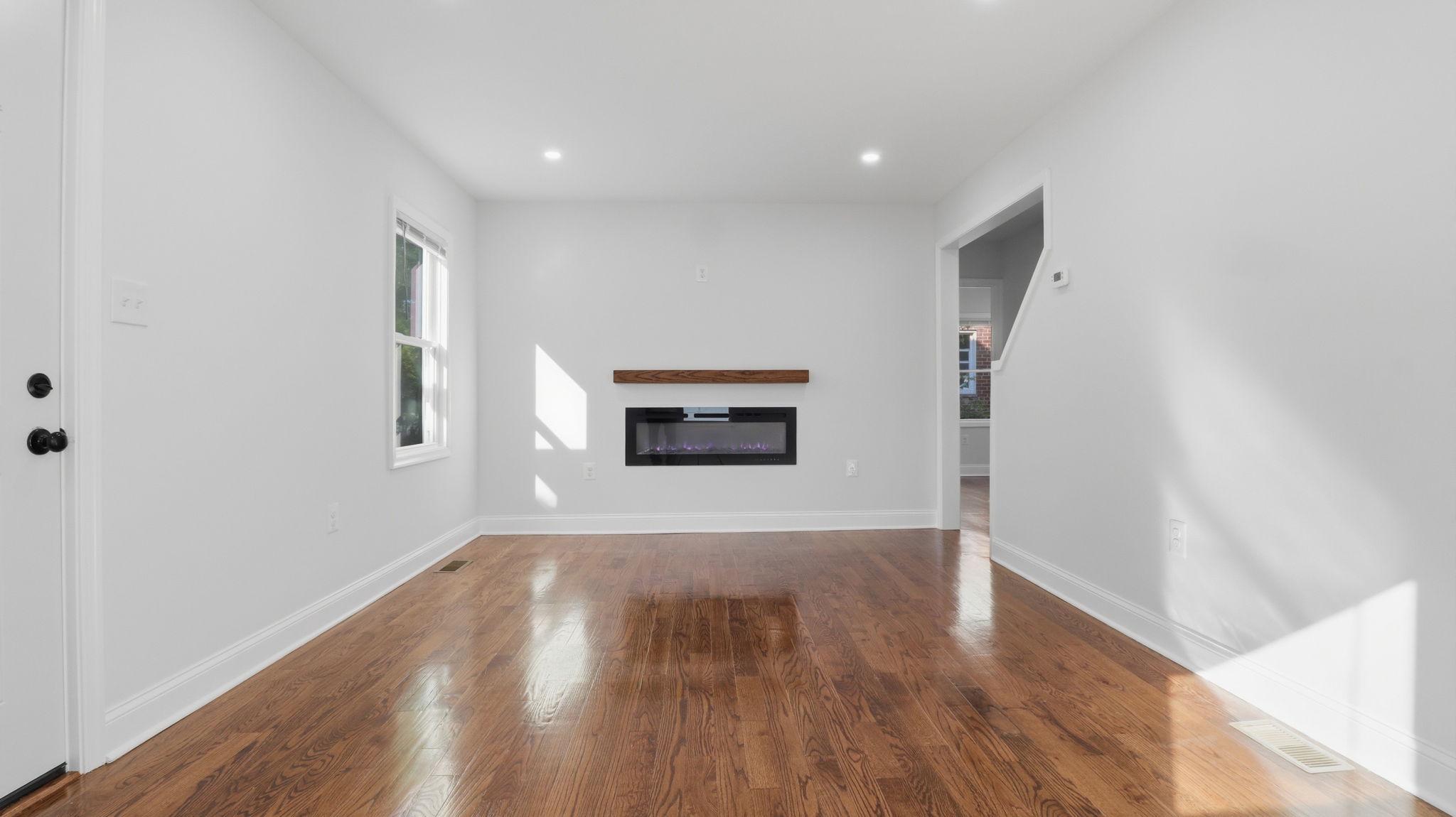 5633 Jamestown Road Hyattsville, MD 20782 - Photo 5 of 47 Living Room w/ fireplace