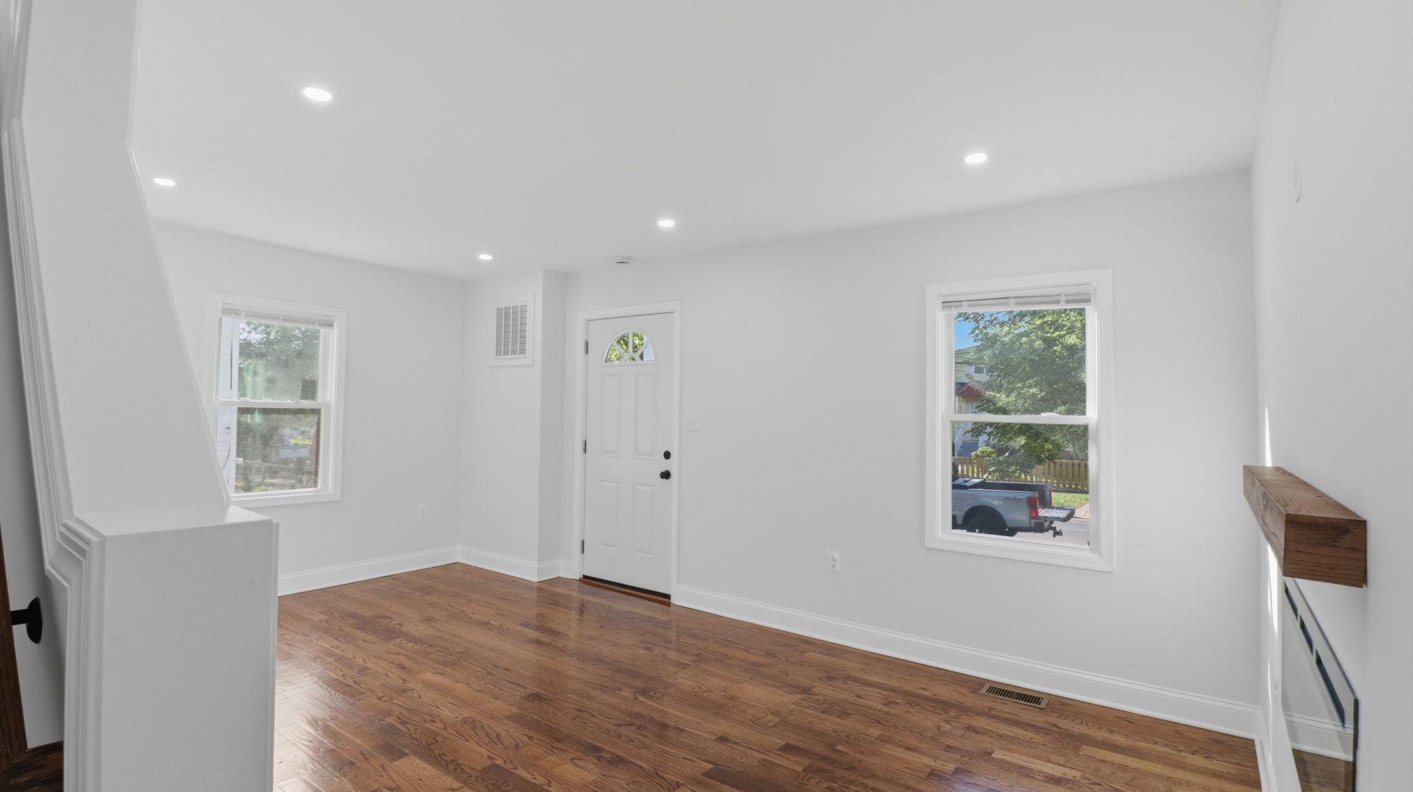 5633 Jamestown Road Hyattsville, MD 20782 - Photo 8 of 47 Living Room w/ fireplace