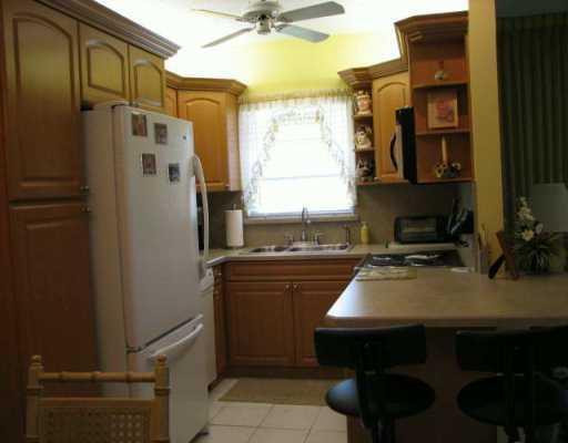 8404 West Sample Road, Unit 237 Coral Springs, FL 33065 - Photo 8 of 8 Kitchen
