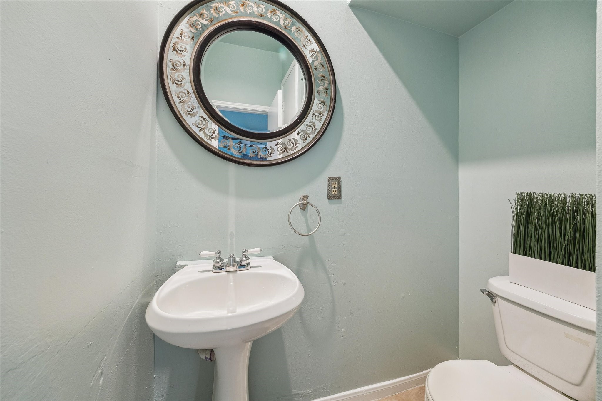 7326 Regency Square Court, Unit 7326 Houston, TX 77036 - Photo 7 of 17 a bathroom with a sink and a mirror