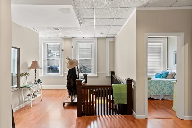 a view of a livingroom with furniture and windows