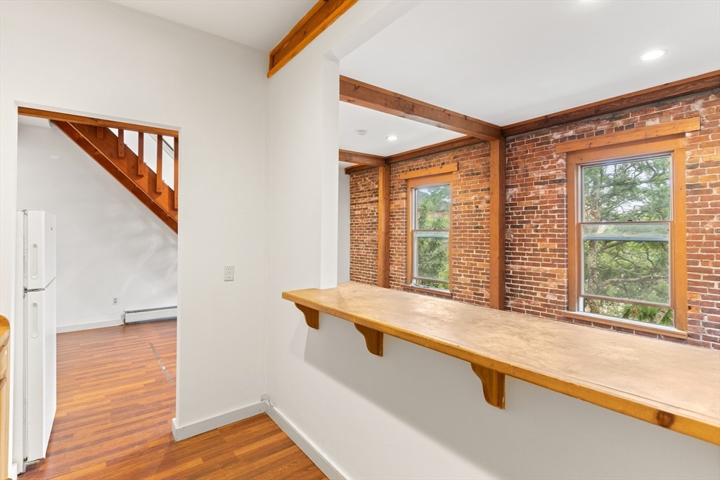 100-102 Main Street Gloucester, MA 01930 - Photo 22 of 40 a hallway with windows