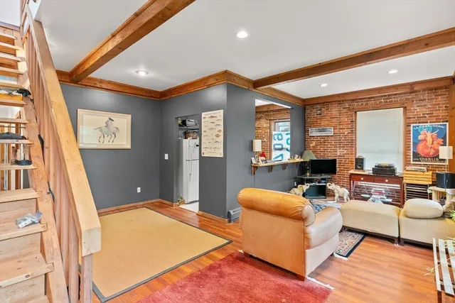 a living room with furniture and a table