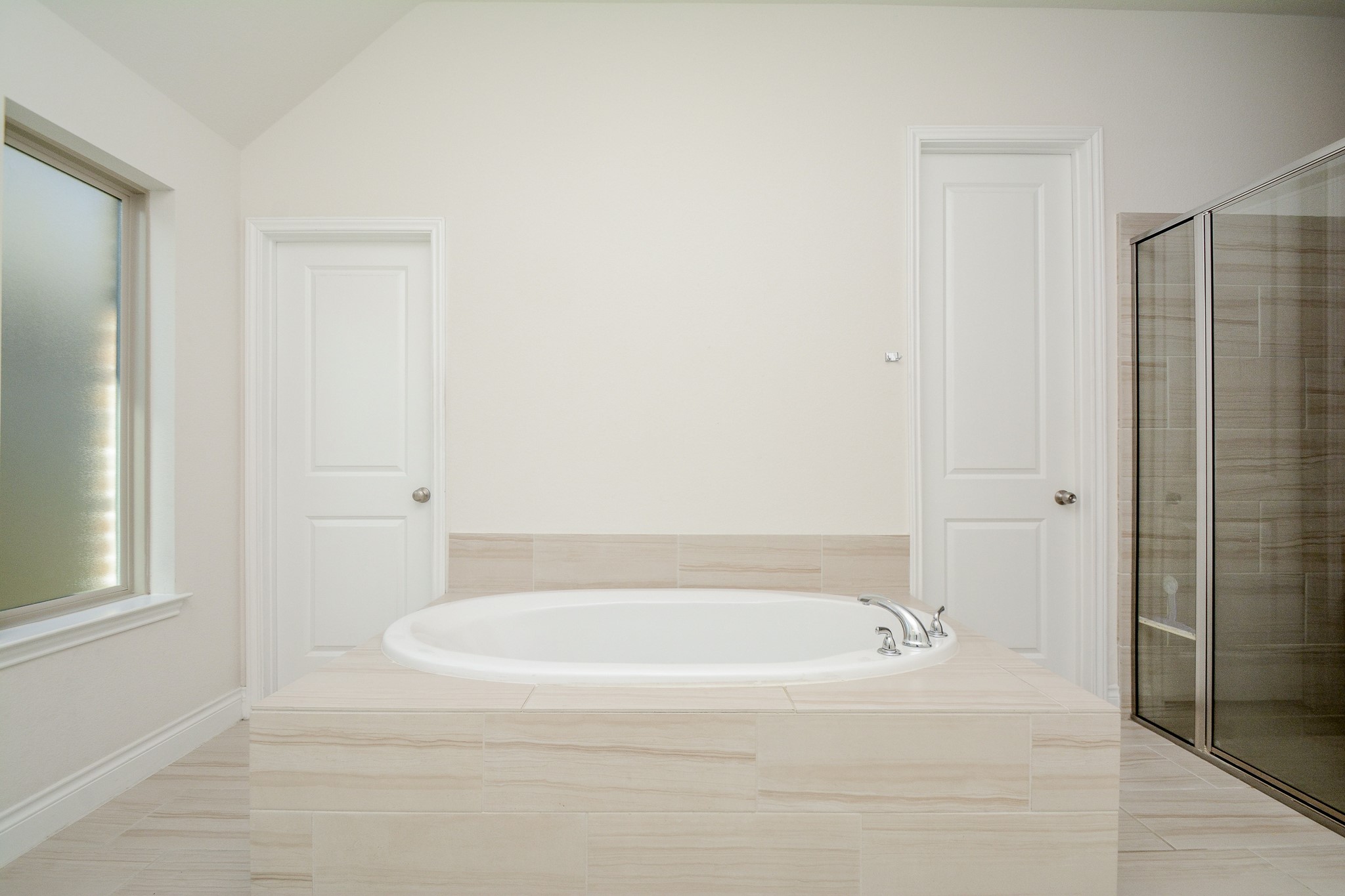 28127 Knight Peak Drive Spring, TX 77386 - Photo 23 of 42 a white bath tub sitting in a bathroom