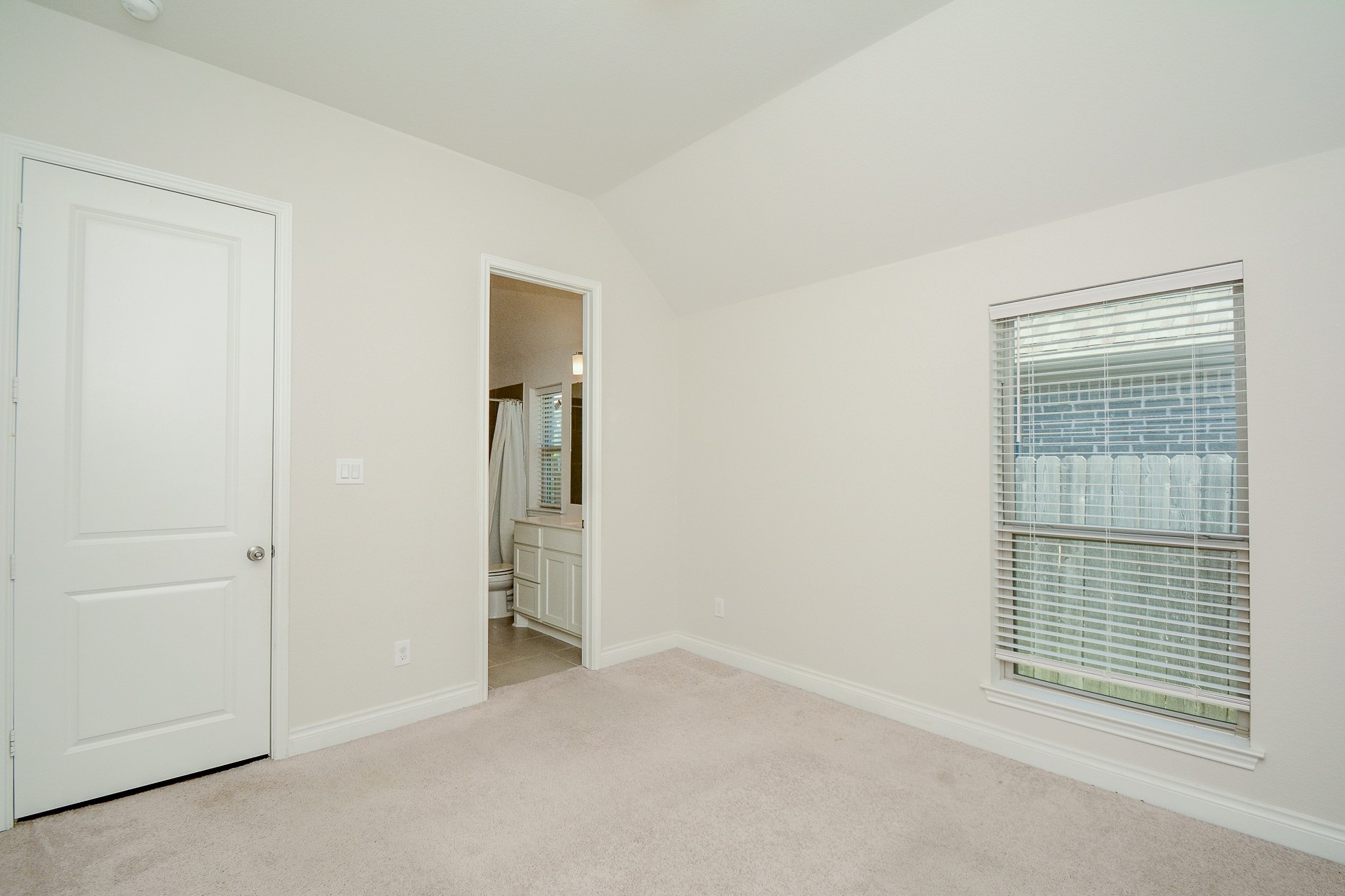 28127 Knight Peak Drive Spring, TX 77386 - Photo 30 of 42 a view of an empty room with a window