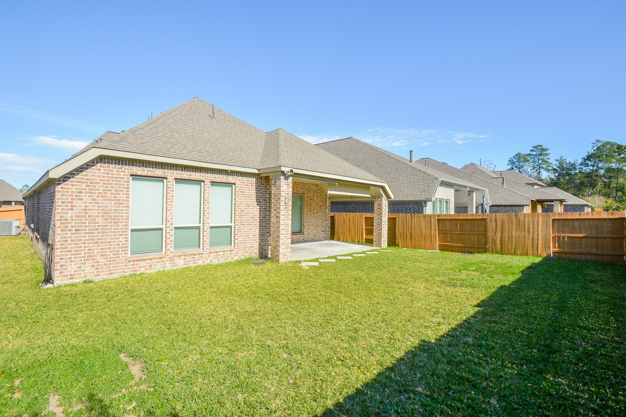 28127 Knight Peak Drive Spring, TX 77386 - Photo 40 of 42 a front view of a house with a garden