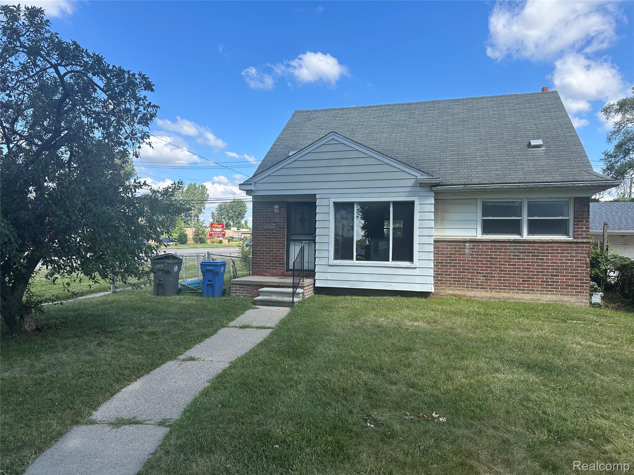 27366 Freda Street Inkster, MI 48141 - Photo 1 of 14 Exterior featuring brick and siding finishes, a gabled roof, and a front walkway leading to the entry