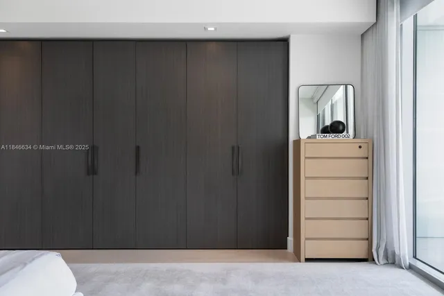a bathroom with a sink and a large mirror