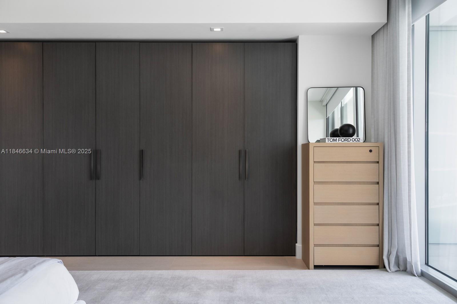 1 Collins Avenue, Unit 605 Miami Beach, FL 33139 - Photo 12 of 33 a view of walk in closet