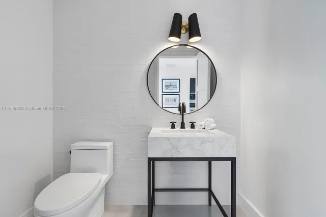 a view of a room with a sink and dishwasher