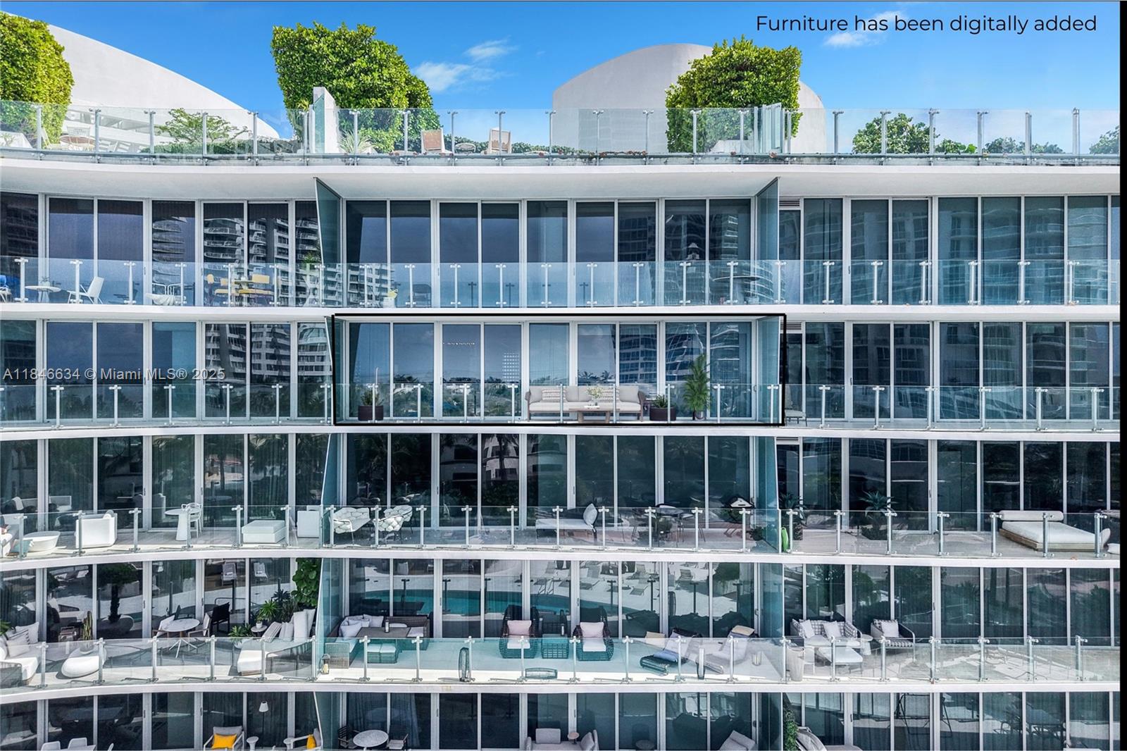 1 Collins Avenue, Unit 605 Miami Beach, FL 33139 - Photo 31 of 33 a view of a large building with a lot of windows