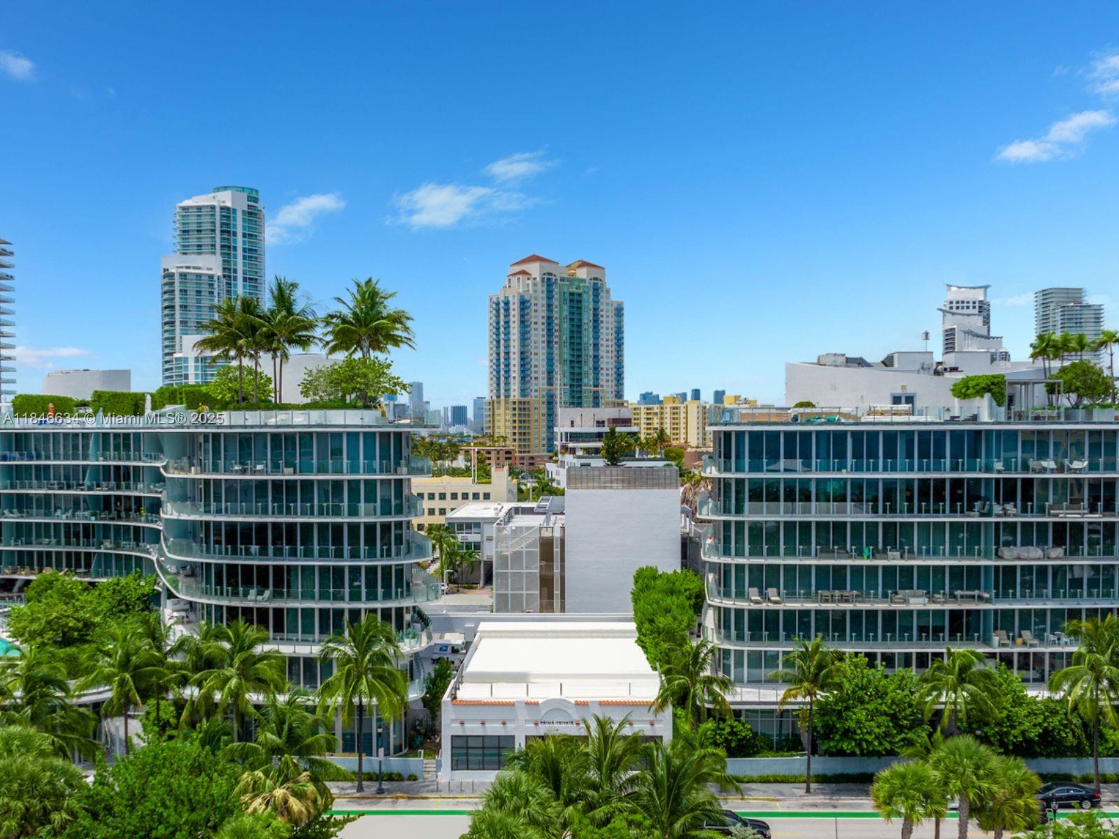 1 Collins Avenue, Unit 605 Miami Beach, FL 33139 - Photo 32 of 33 a view of building with outdoor space
