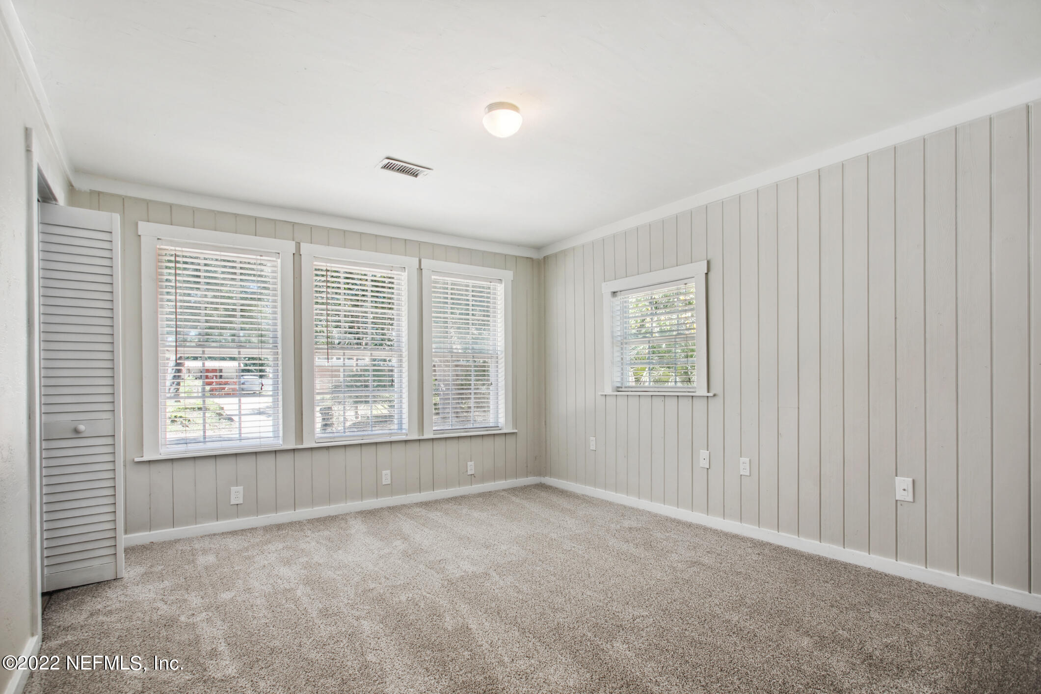 97 Spring Street St. Augustine, FL 32084 - Photo 13 of 18 a view of an empty room with a window
