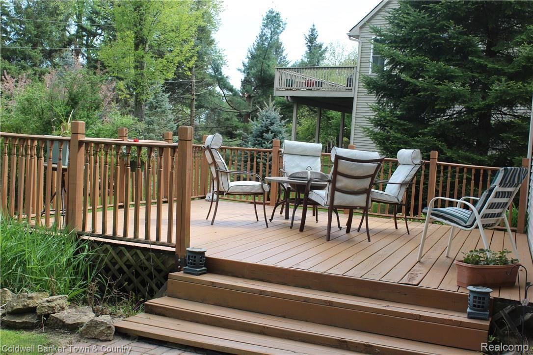 11882 Knob Hill Road Brighton, MI 48114 - Photo 37 of 41 Enjoy your coffee on your peaceful deck