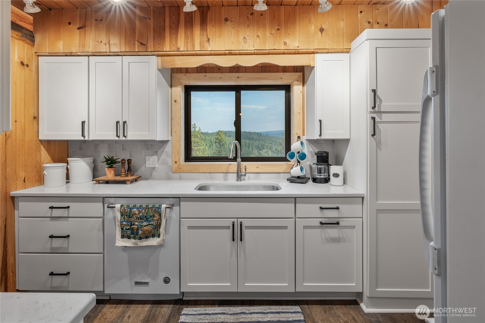 300 Teanaway Ridge Way Cle Elum, WA 98922 - Photo 11 of 38 a kitchen with stainless steel appliances granite countertop a sink and cabinets
