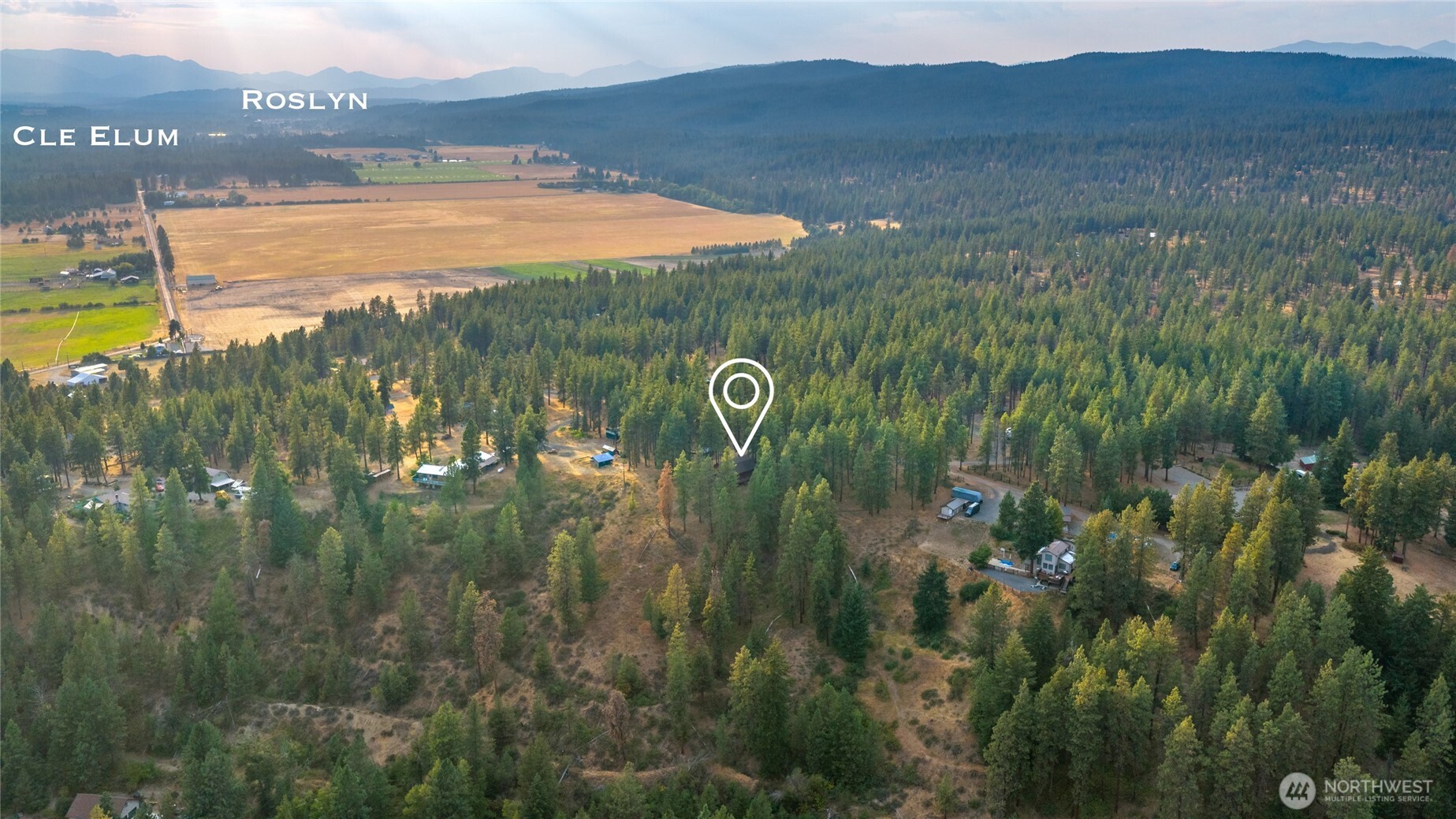 300 Teanaway Ridge Way Cle Elum, WA 98922 - Photo 36 of 38 a view of a lake and green valley